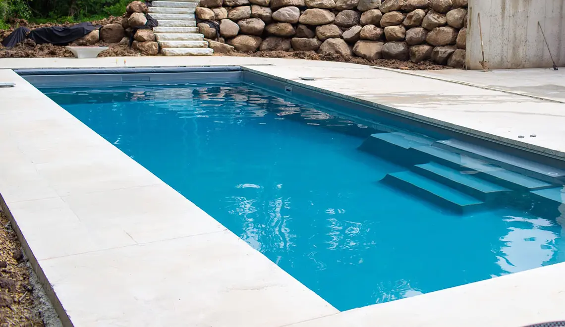 Leisure Pools Columbus Ohio The Grand fiberglass pool with a large rectangular shape great for swimming.